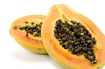 sliced papaya showing the seeds