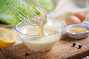 a small dish of mayonnaise